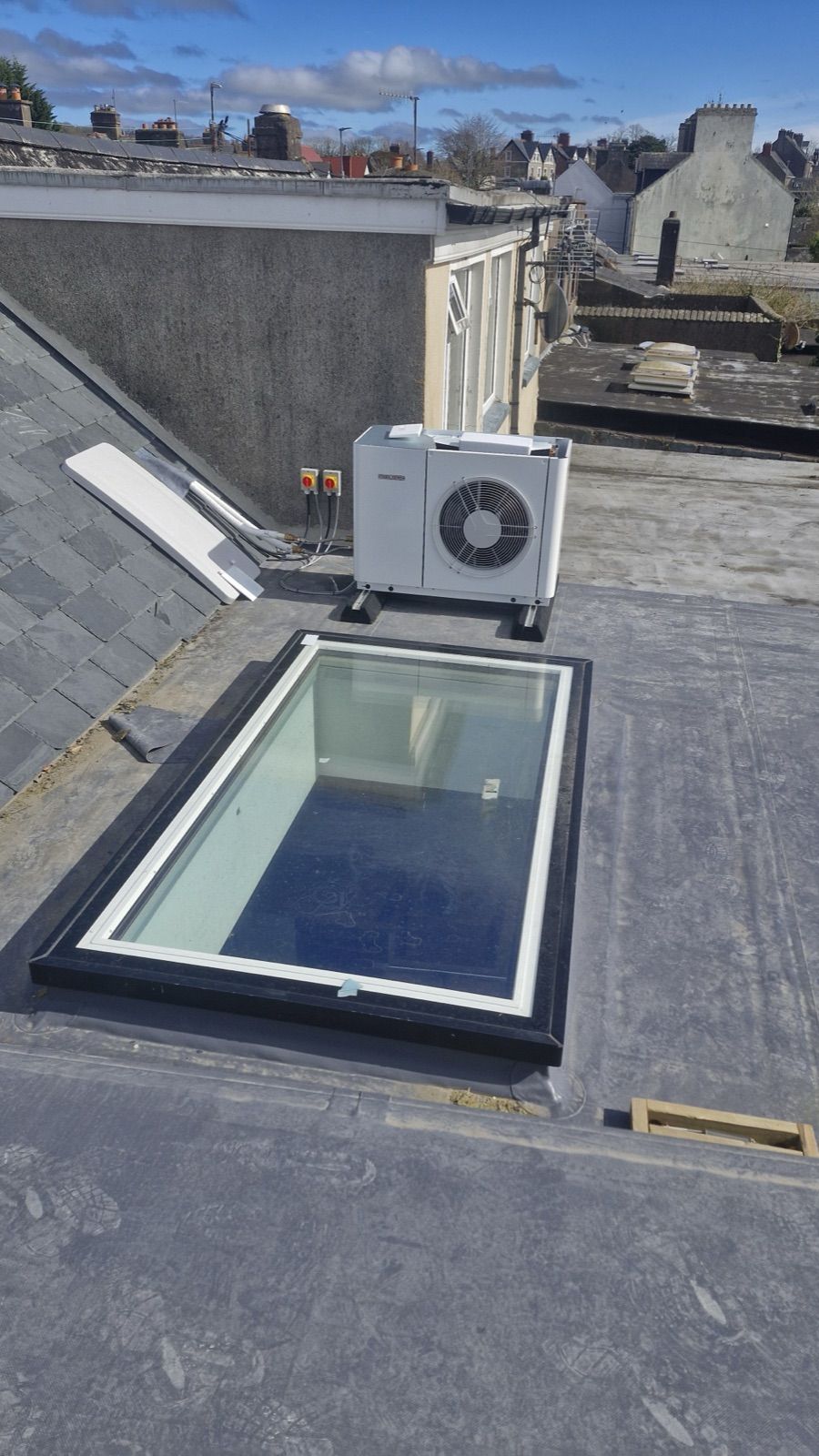 Heat pump unit installed on a flat roof